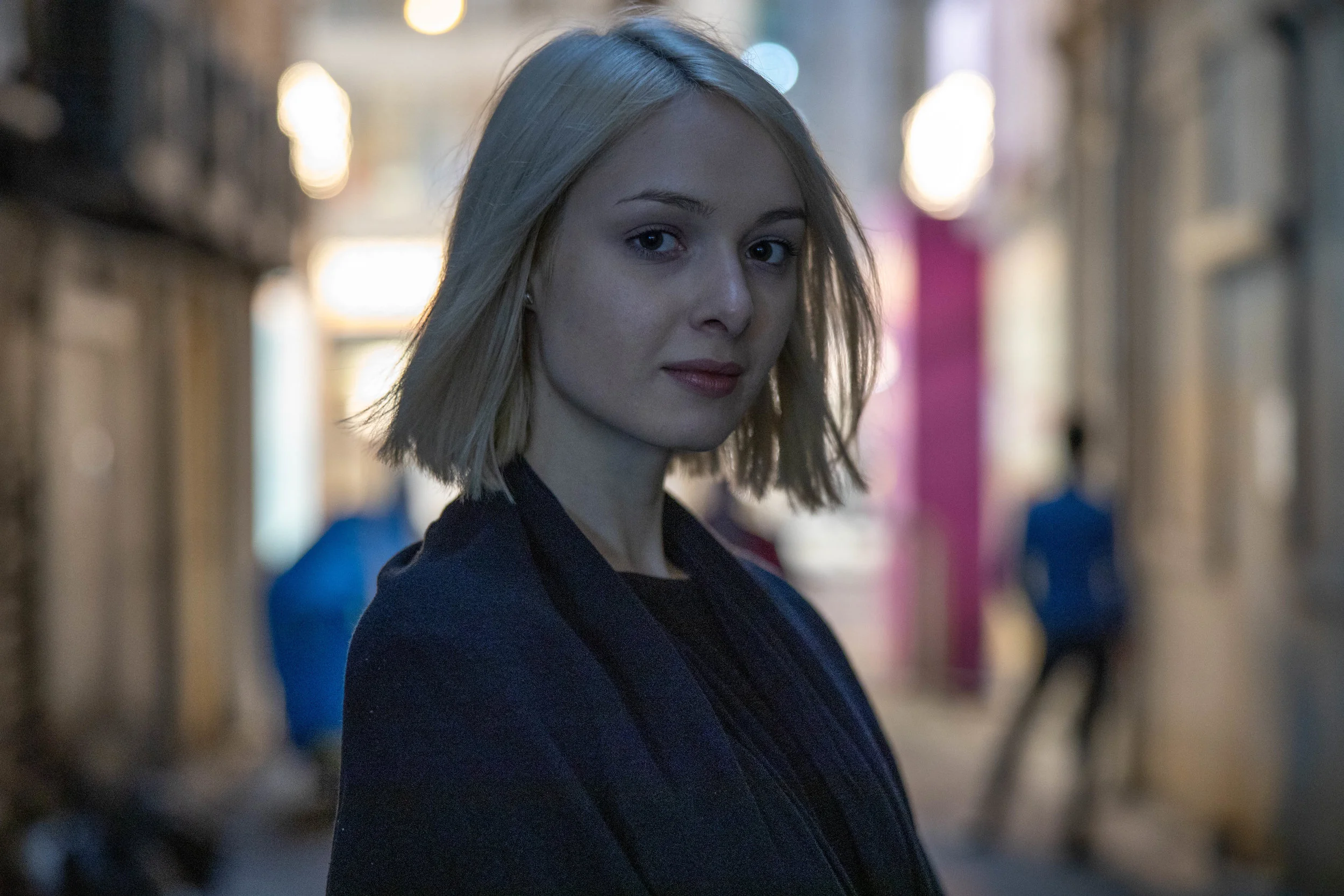 Canon EOS-R + Canon RF 28-70mm f/2L USM @70mm, f/2, 1/60s, ISO 2000 - This image capture took me over twenty tries, since I couldn’t get the camera to acquire focus in very low light and extreme backlight… hence the photobombing in the background. Beggars can’t be choosy if they cannot lock onto focus with the background clear of stray passersby.