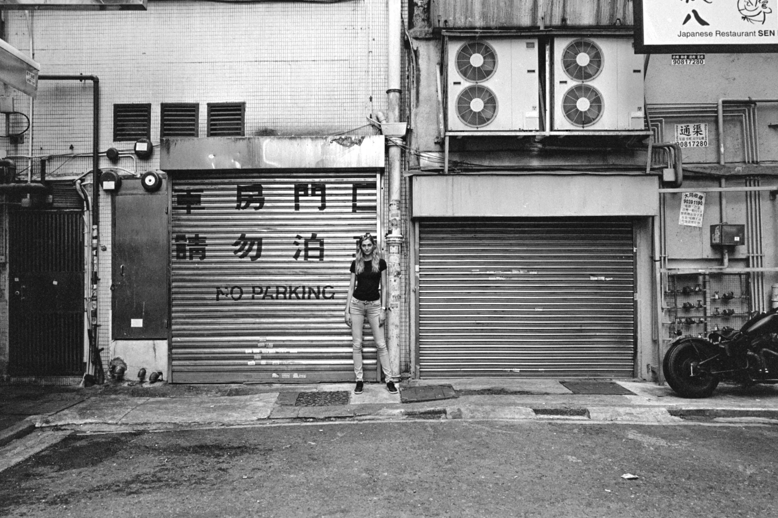 Leica MP Titan + Leica 28mm f/2 Summicron-M ASPH + Kodak Tri-X 400 - Cropped to 35mm equivalent to remove plastic bags on the right side of the image. Incidentally, image was off centered… so the cropping worked out better than expected. A case of poor framing at the moment of documentation.