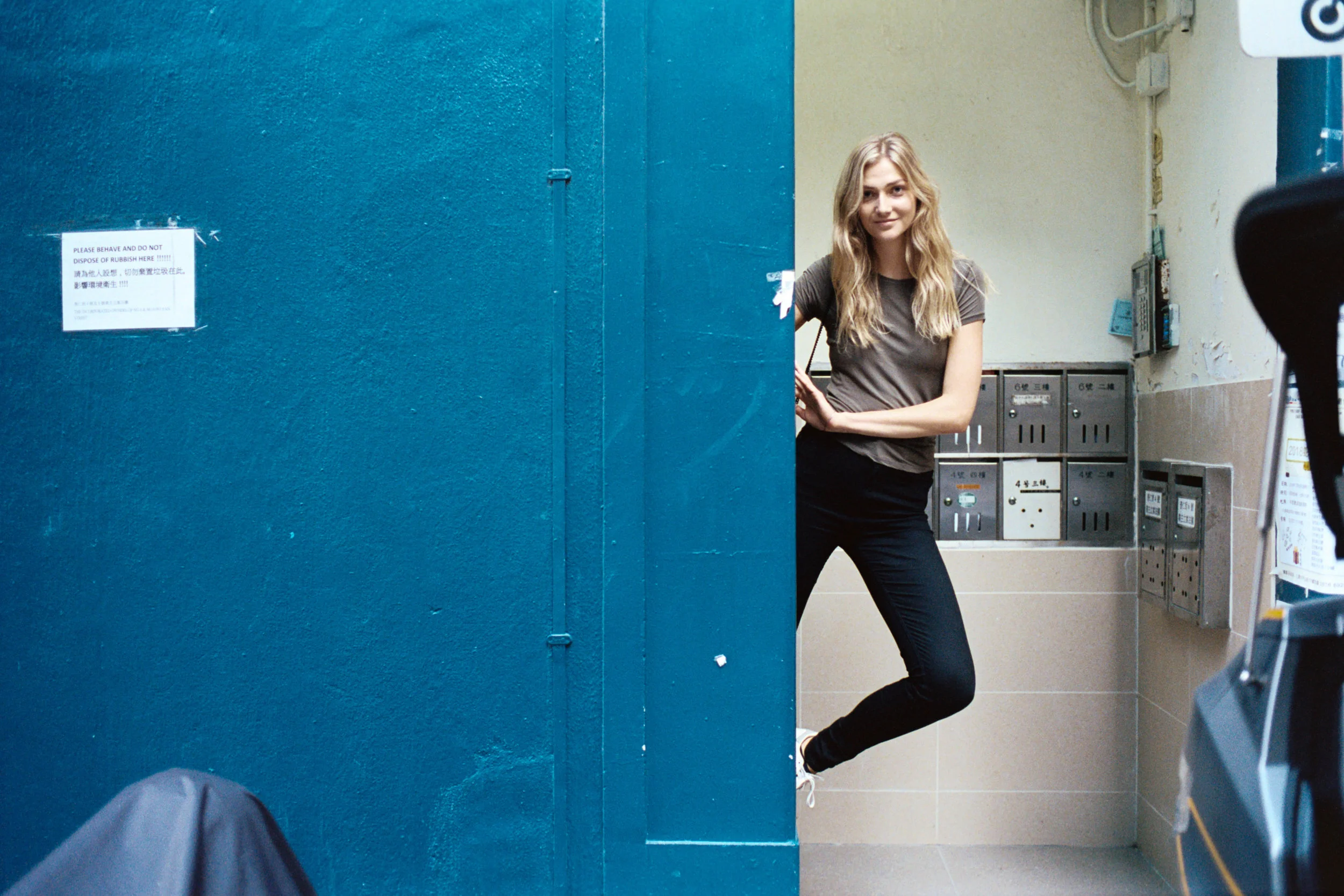 Kodak Portra 400 @ 35mm Focal Length - Compositional variables include strong blue color doorway.