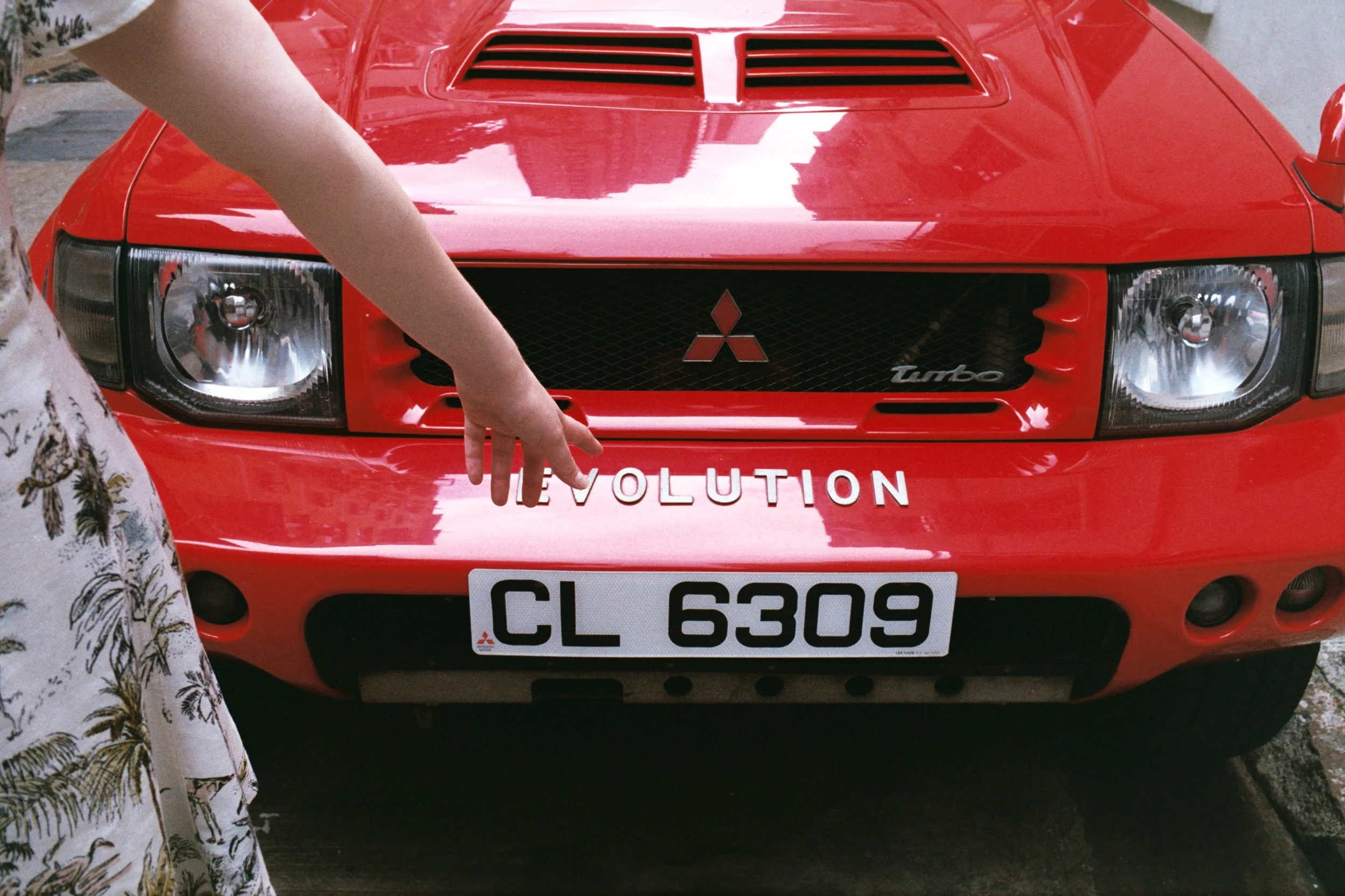 Fujifilm Superia Xtra 400 @ 35mm Focal Length - A Mitsubishi Pajero Evo