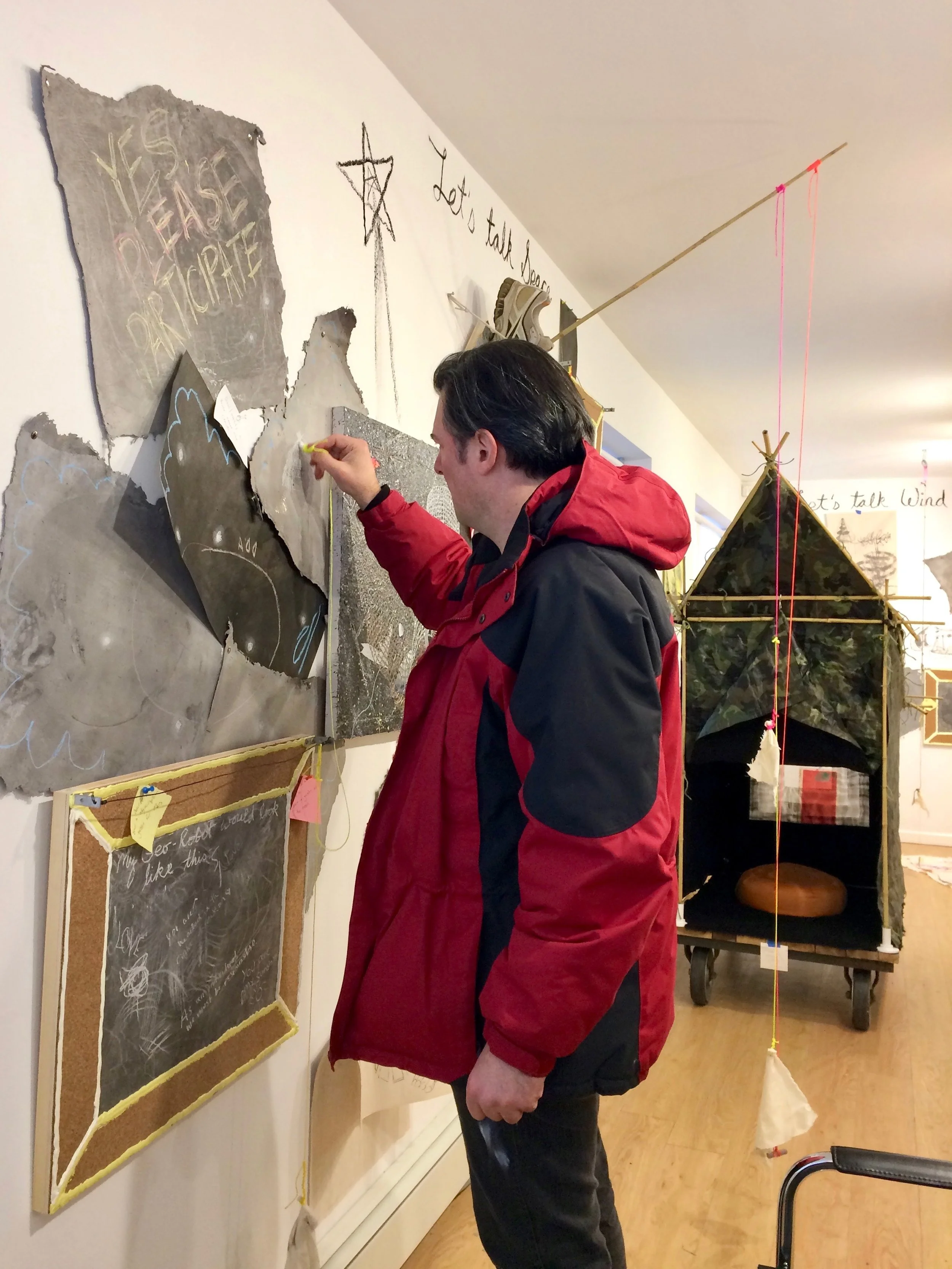 Beacon resident Greg Slick contributes to the installation. Photo Credit: Matteawan Gallery