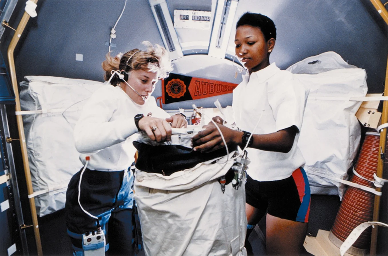 astronauts Dr. Jan Davis (left) and Dr. Mae Jemison working on the space shuttle endeavor in 1992. They were among the first american women in space. Photo credit: Nasa/wikimedia commons
