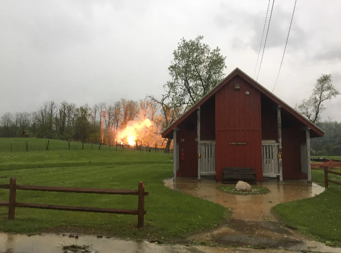 An electrical fire blazing on 9D, in front of Stony Kill Farm. This view is of their bathroom facing 9D. The fire was not in any of Stony Kill's buildings and all of their farm animals are OK. Photo Credit: Common Ground Farm