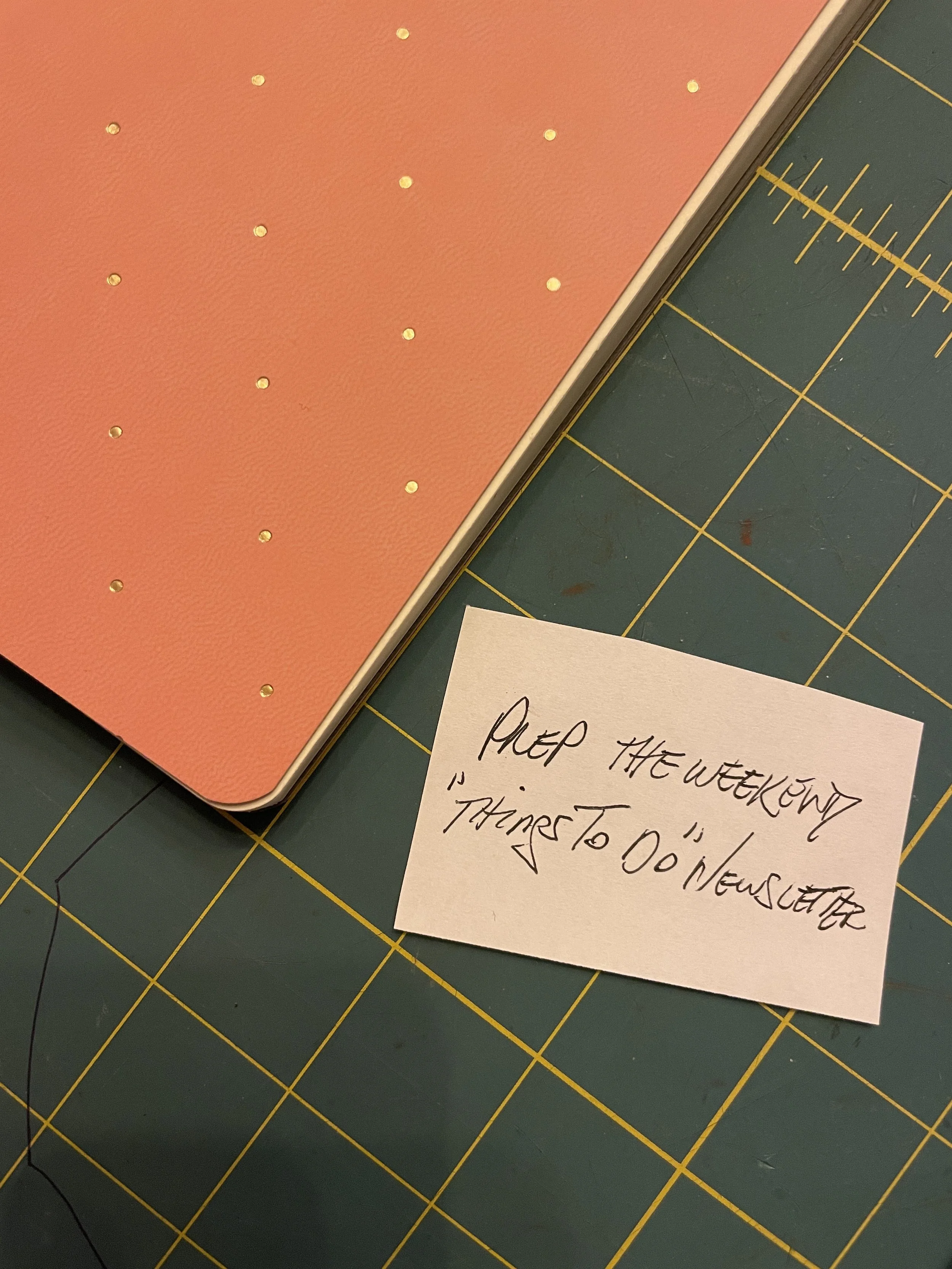 prepping the weekend newsletter cutting board.jpg