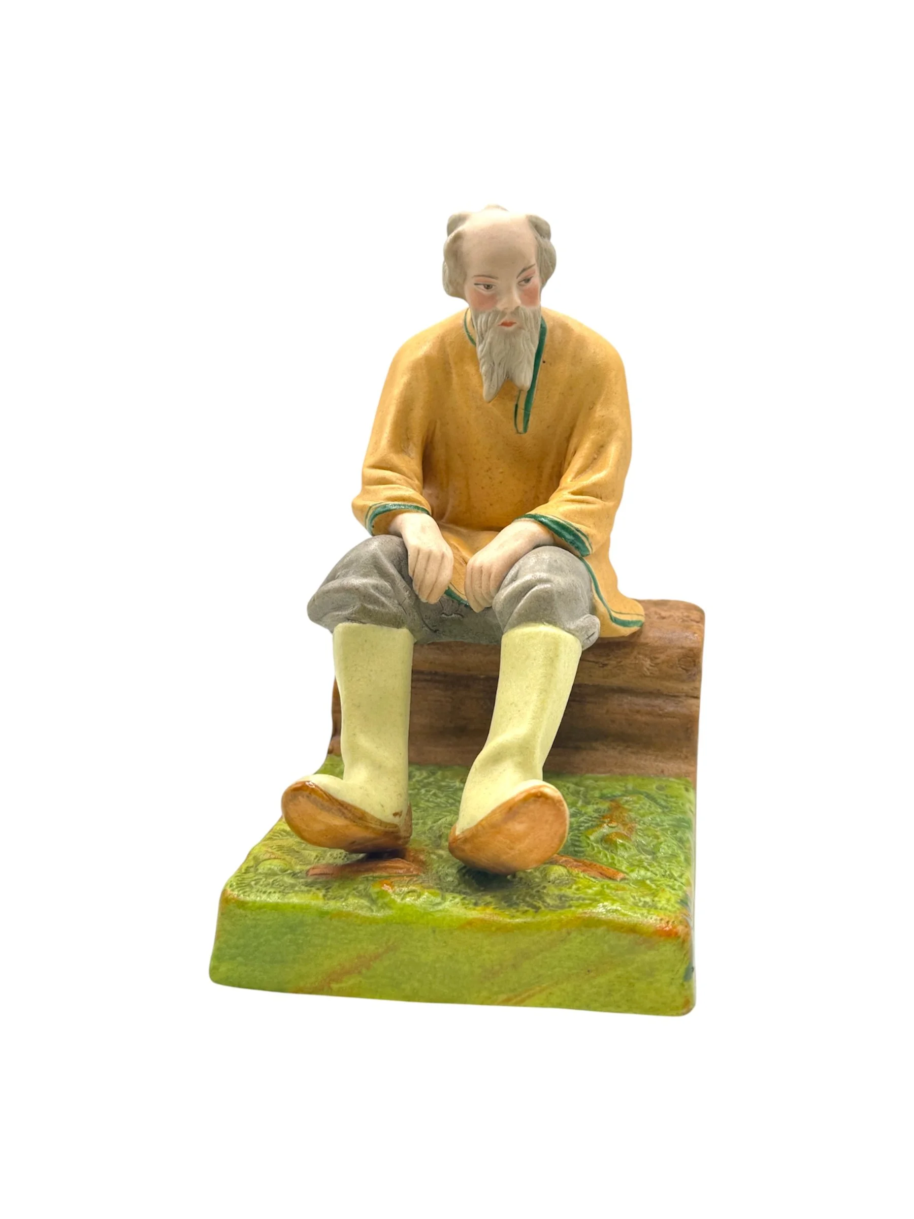 Russian porcelain figure of an old man sitting by Dimetrov Factory after famous gardener producer, c1930s.