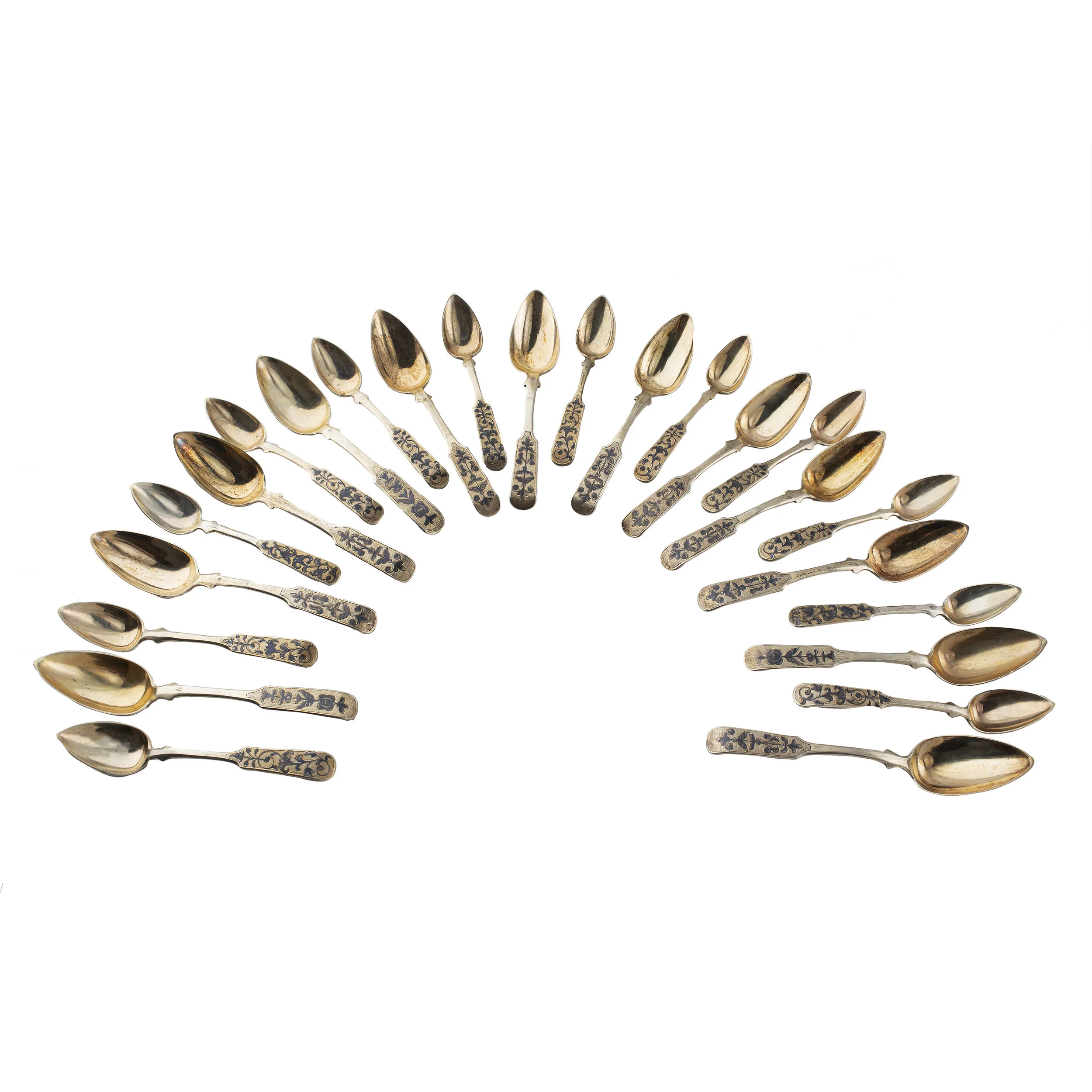 A Set of Twenty-Four Silver Gilt Niello Spoons