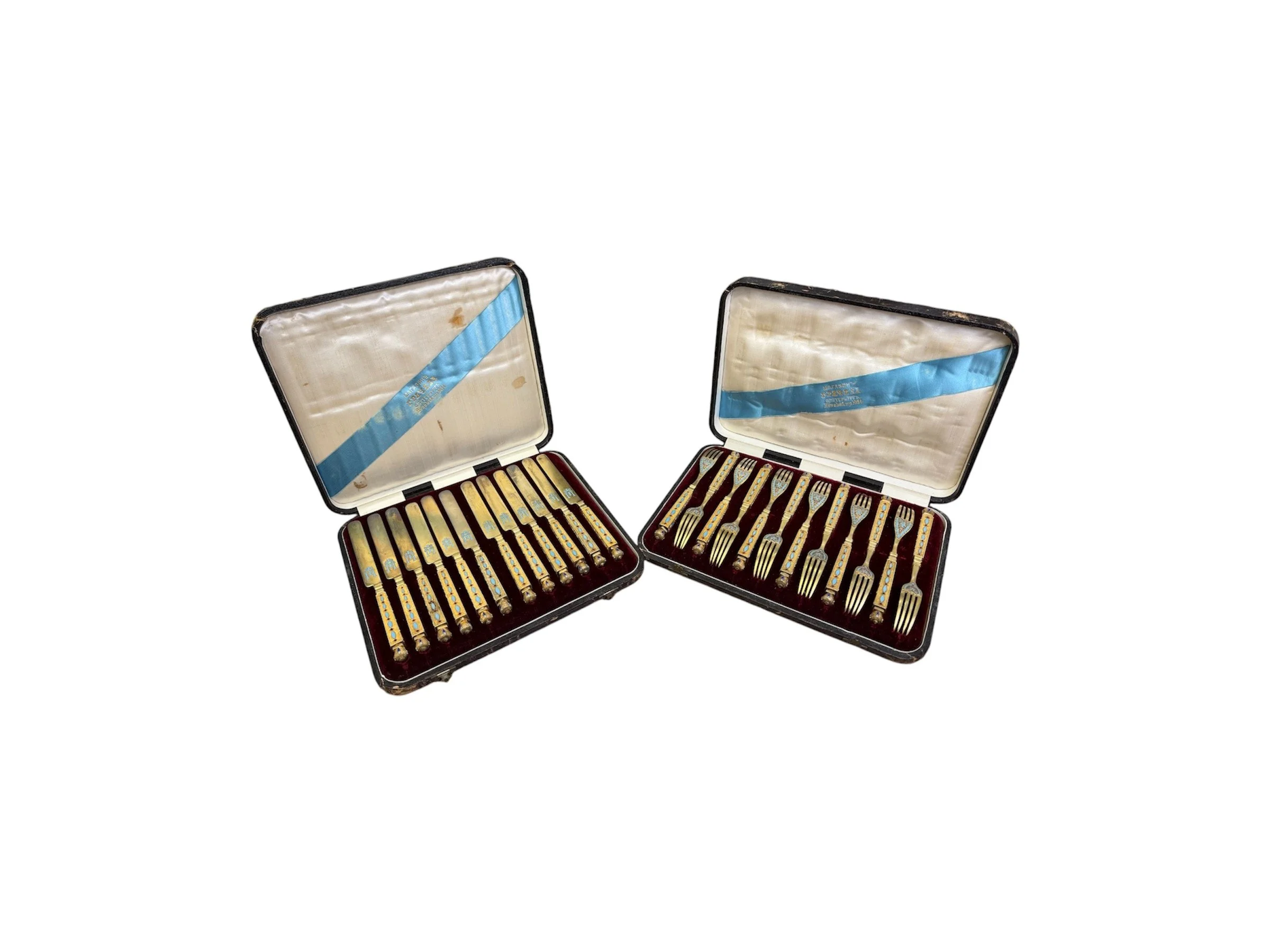 Russian silver gilt and cloisonné enamel set of twelve forks and knives by G. Grachev, St Petersburg, c.1880