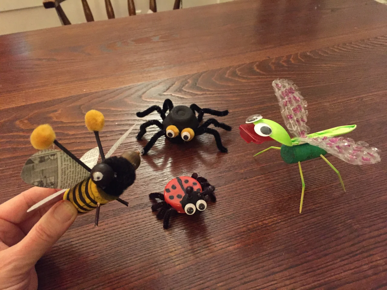 Update Class 7: Things that crawl or fly Turns out we don’t go through as much Tropicana OJ as I thought, so the lion will have to wait! Since we didn’t have a chance to make the spider during our Halloween zombie class, let’s see what kind of bugs the kids come up with. Mine included: Bumblebee - cork, acorns (picked up from the soccer fields), newspaper wings Spider - egg container, pipe cleaners Ladybug - milk lid, wine cap head, pipe cleaners Dragonfly - cork body, plastic spoon, toothpicks, bubble wrap, and a contact lens case