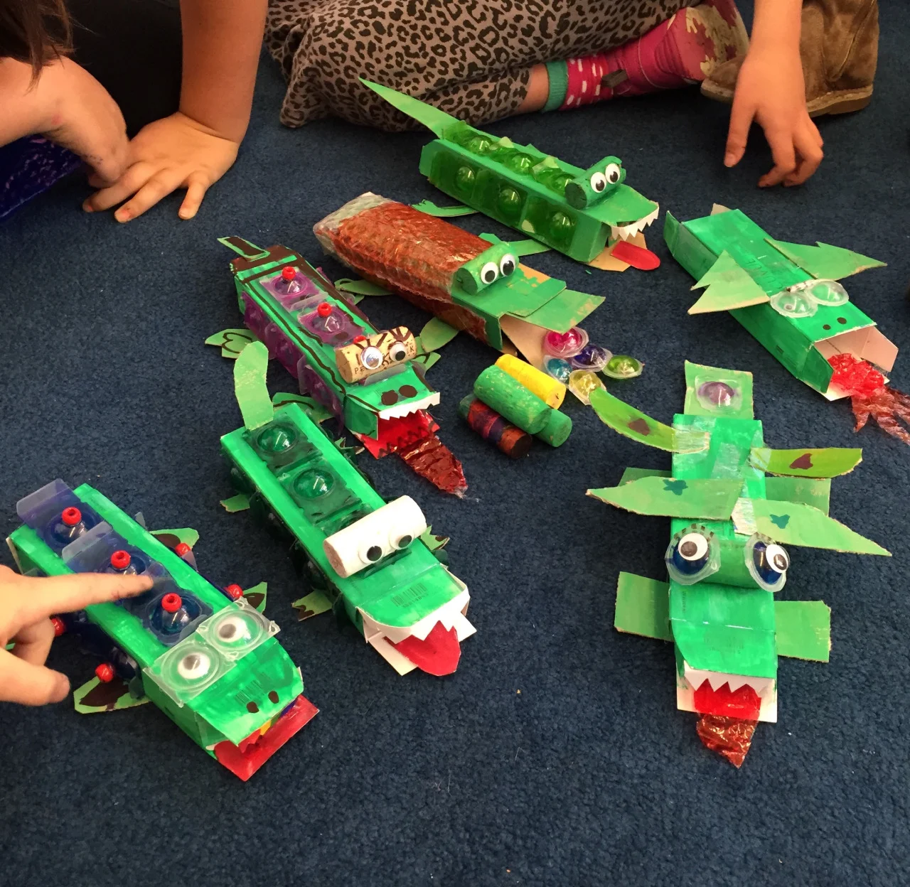 Class 6 Results: Seeing green Class began with one kid saying “Sally isn’t here.” Other kid. “Maybe she’s sick.” Same kid, with more enthusiasm. “Maybe she’s dead!” And finally, “Maybe her head exploded!!!” Yes, these are the angels in my class. Alligators, fire-breathing dragons, and fire-breathing, bead embellished lizard with eyelashes. Love these kids.