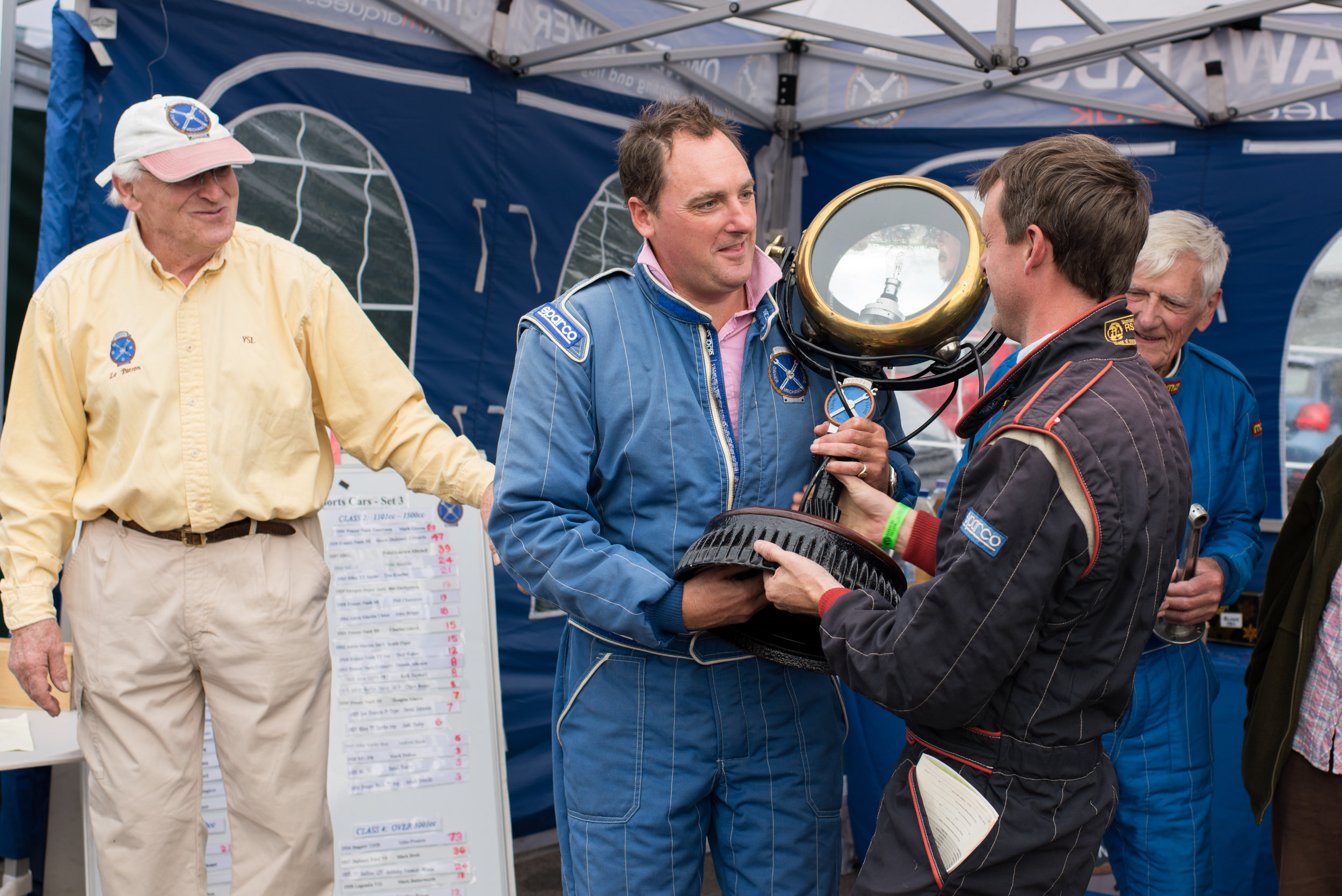 John Guyatt presides as 2015 winner Andrew Mitchell hands the coveted ODM trophy to Duncan Potter: Scott Mattock