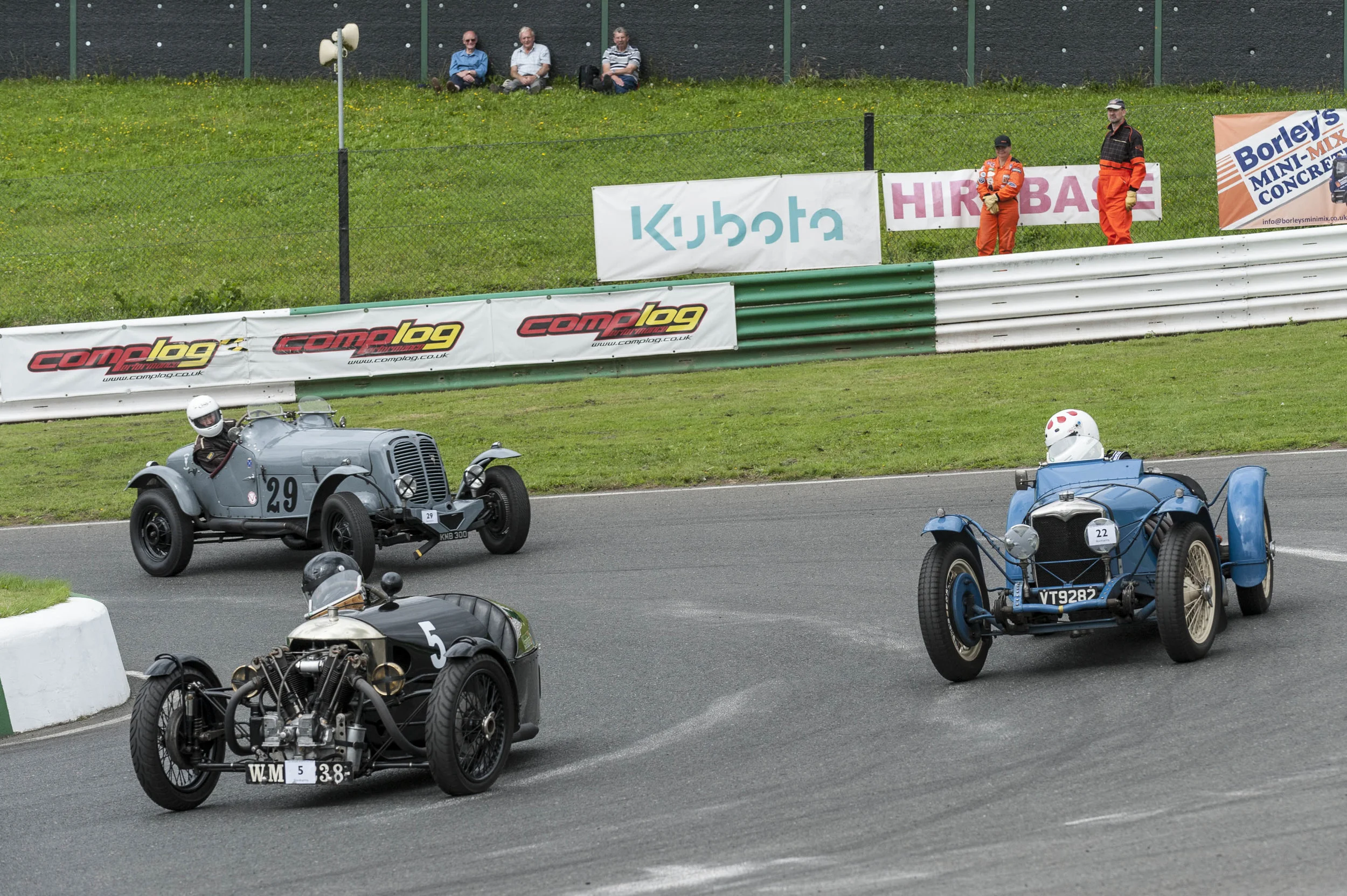 Darbyshire ahead momentarily in the Morgan, followed by race winner Kneller in the Riley Sprite and Brett, his front suspension deranged: Peter McFadyen