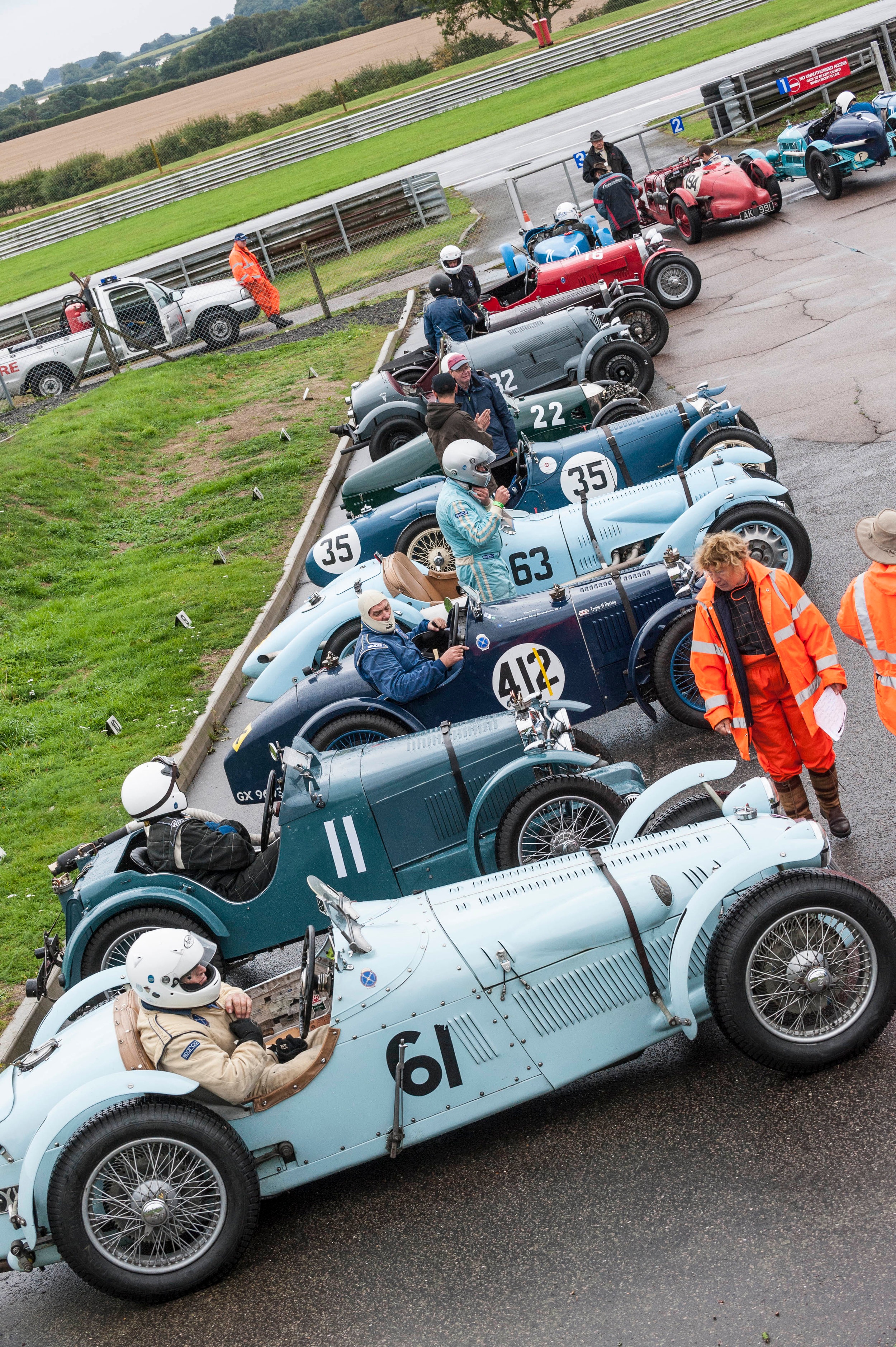 Le Patron in the foreground joins the combatants in assembly, hoping that the rain clouds will pass…………….. Peter McFadyen