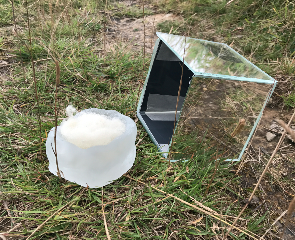  2017  4'' squared  glass with hand etched viewfinder (site specific installation Lybster, Scotland)     *each box contains a 3'' square glass basket containing found wool, when one looks through the viewfinder the glass is not visible, prompting the