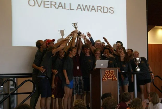 Our team hold the second-place trophy that we all worked hard to earn.