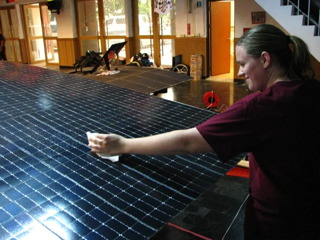 Jessica Lattimer gives the array a bath.