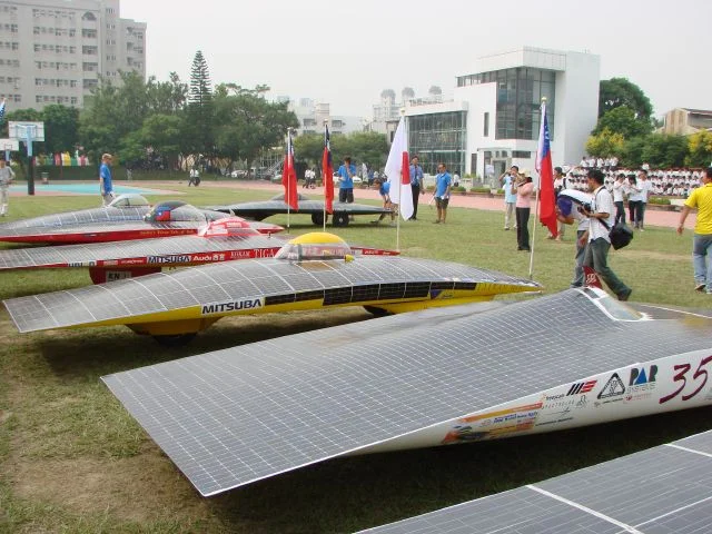 The cars line up for the exhibition. Borealis III is the only car without a bubble canopy.
