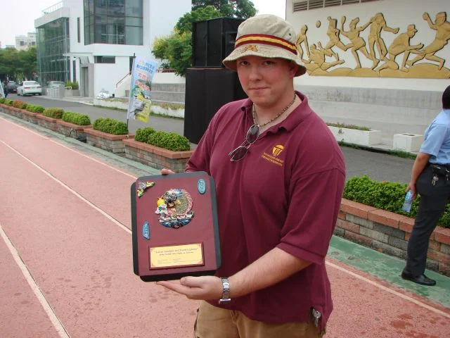 Pat shows off our participation award.