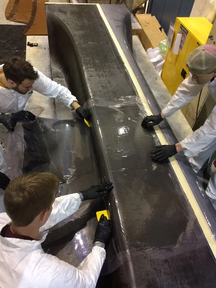 UMNSVP members work very hard to make the carbon fiber shell. The Eos II shell was led by Kory Soukup