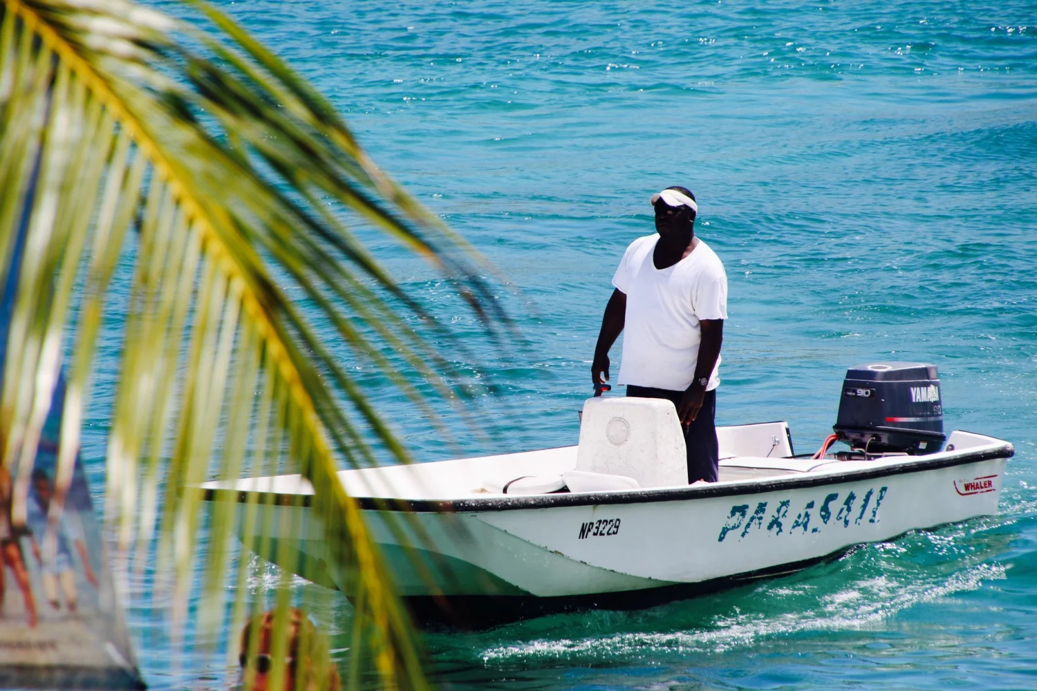 I wouldn't advise you go Parasailing with this dude - his boat looks like it couldn't launch an umbrella let alone a parachute with me on the end of it.