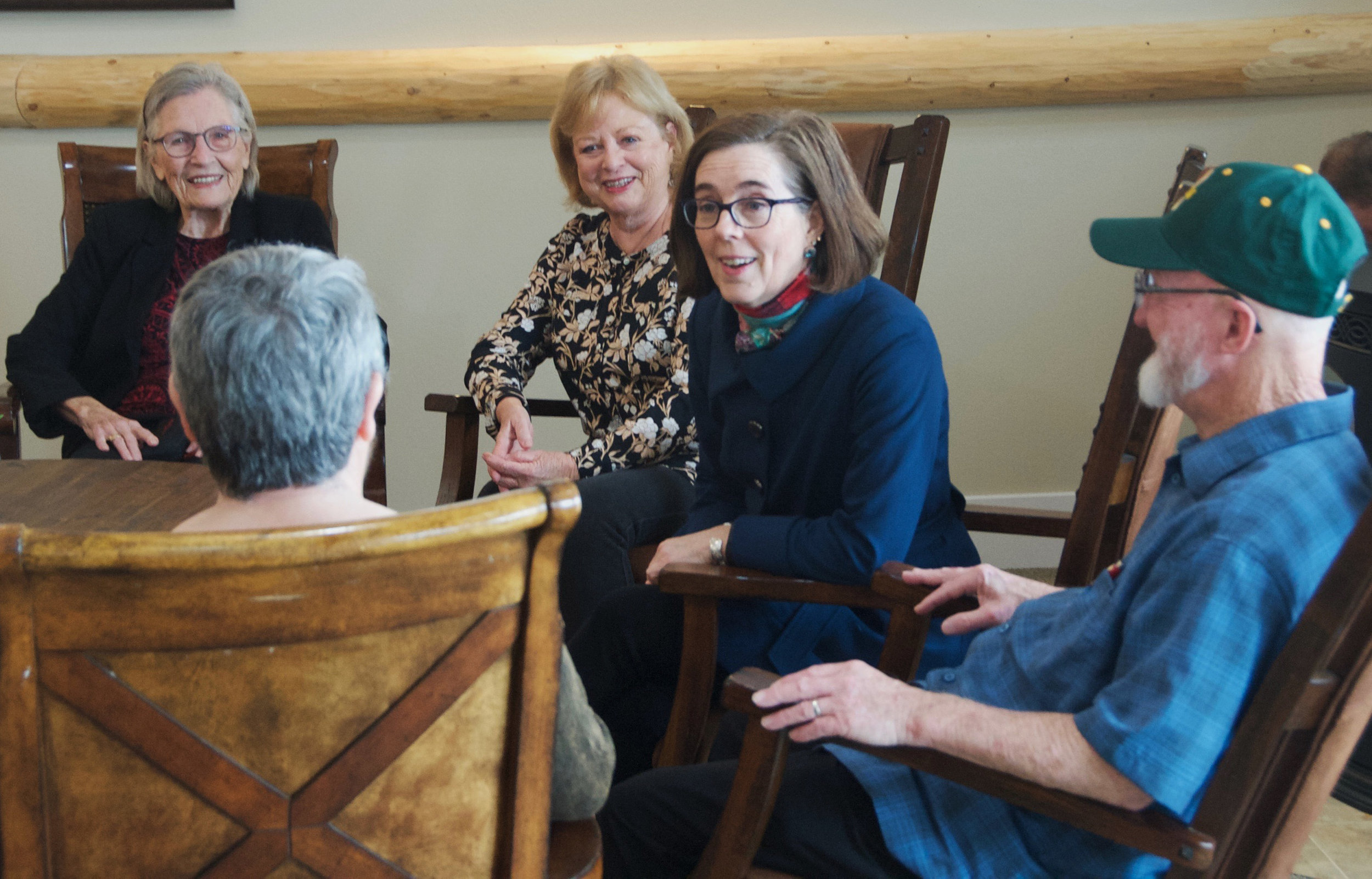 Governor Kate Brown gets to know some of our residents at IronHorse Lodge
