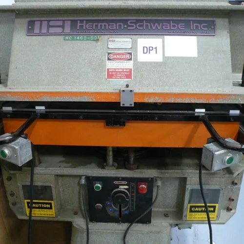close up of die cutting machine