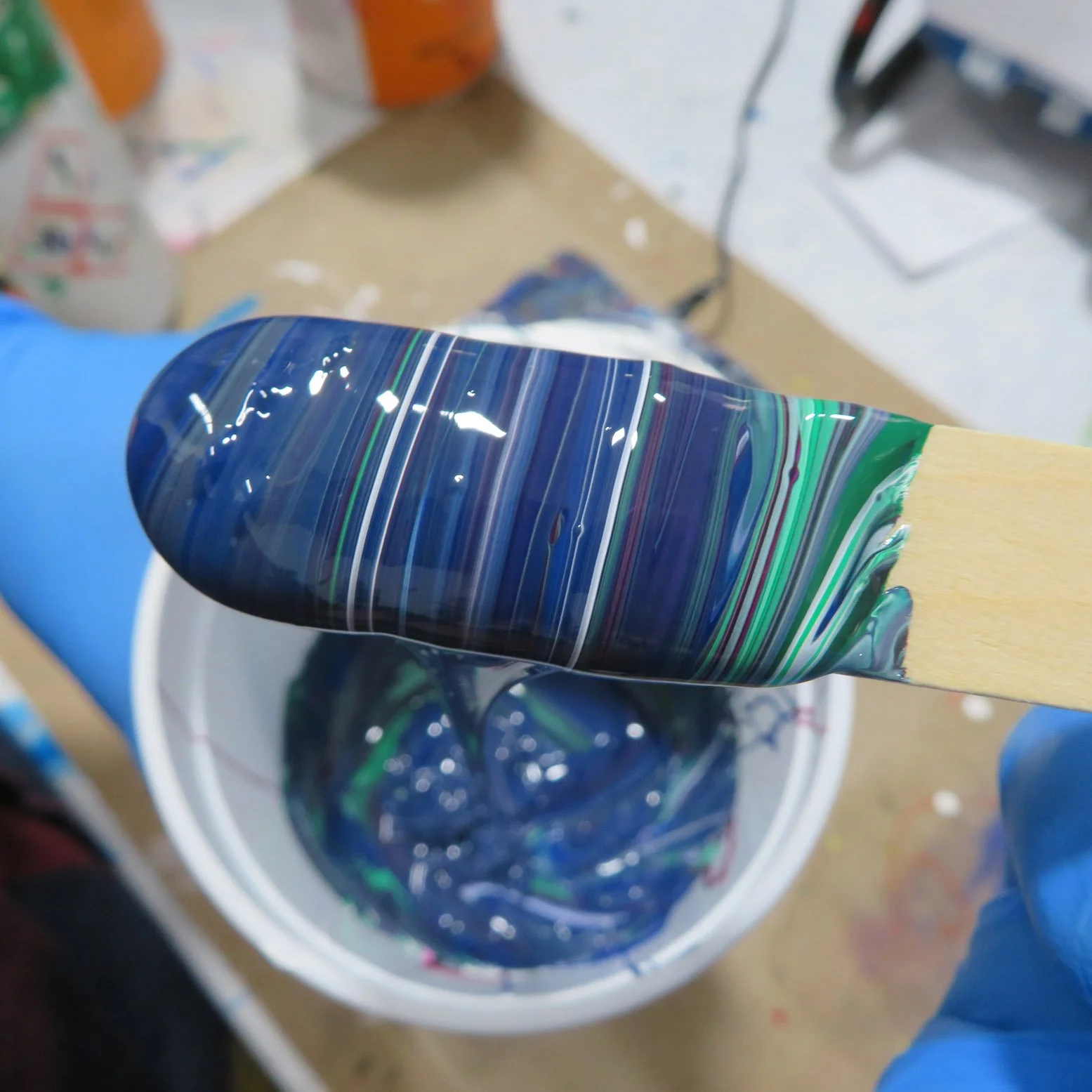 close up of mixed ink on popsicle stick