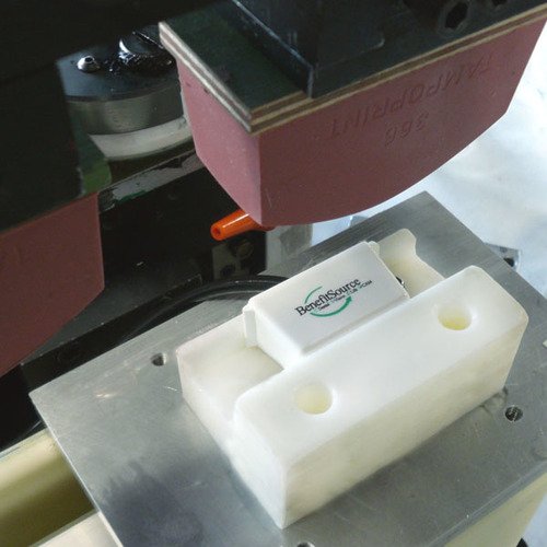 close up of pad printing pill container