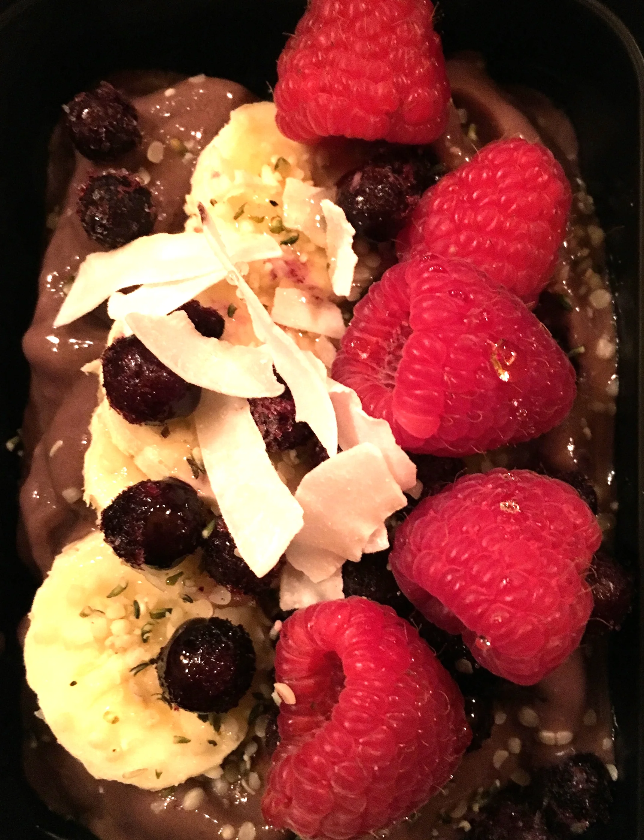 Acai Bowl with Raspberry, Blueberry, Banana and Coconut Flakes