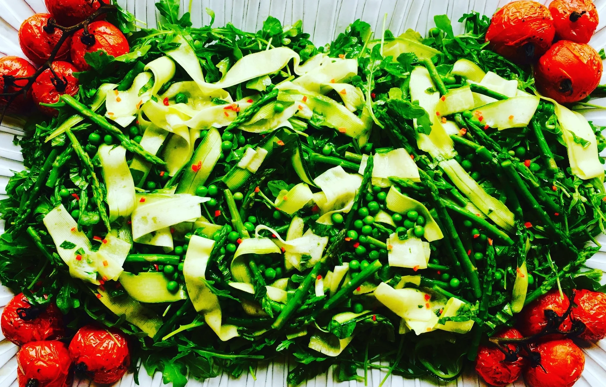 Arugula , English Pea, Asparagus and Zucchini Ribbons with Vine Ripened Tomatoes