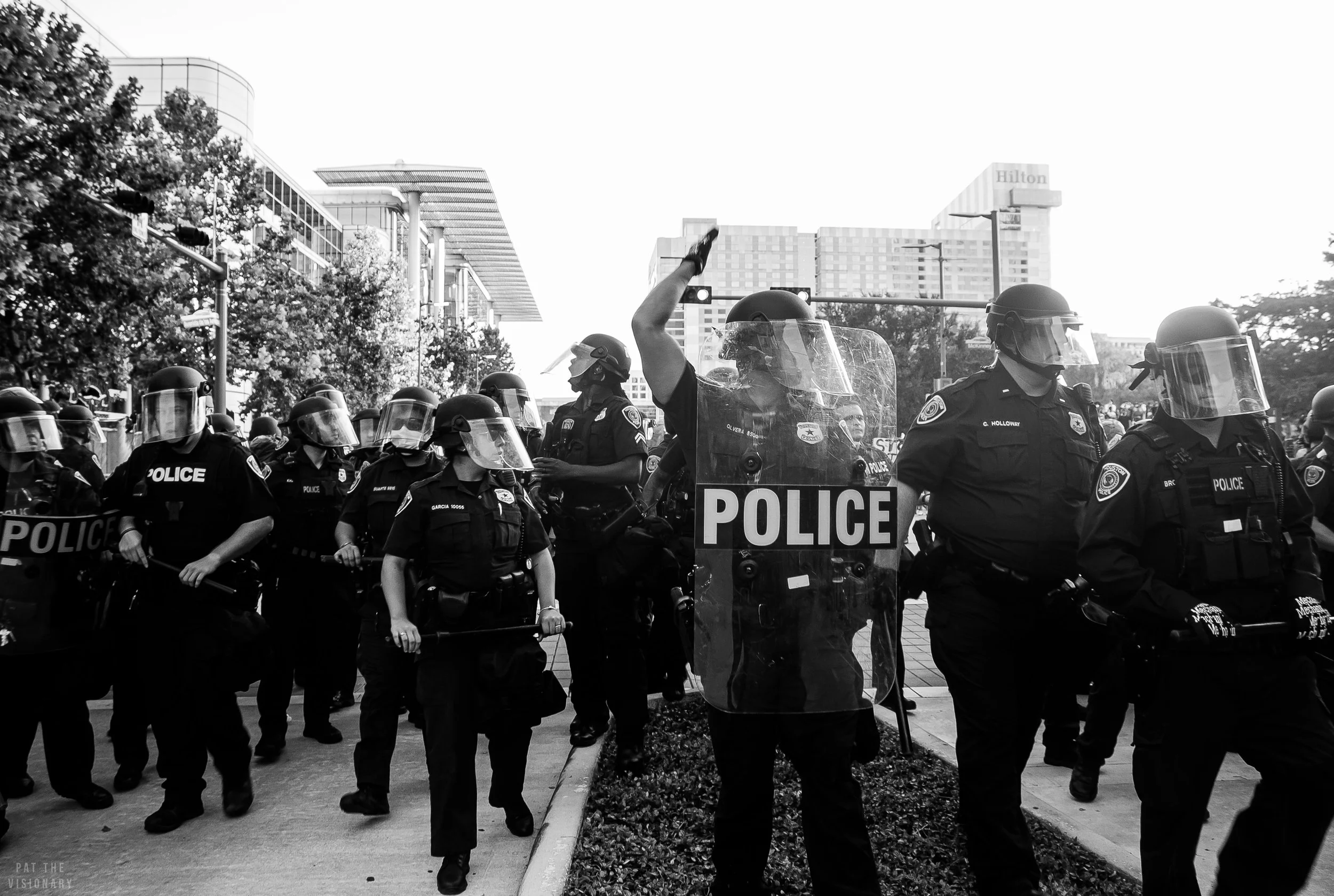 Signal Call - A photo showing a police offering signaling out orders