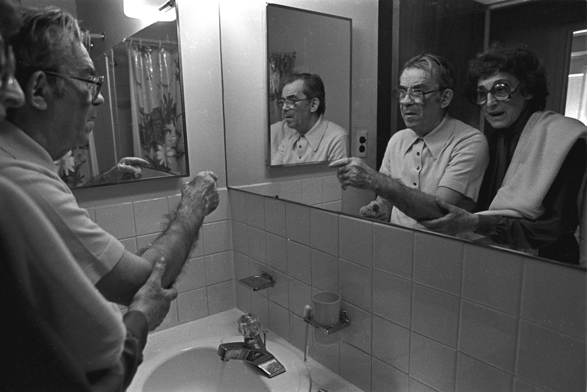 Bert takes Max into the bathroom every morning and helps him shave and brush his teeth. Often, when he sees himself in the mirror, Max becomes alarmed thinking there is a stranger in the room.