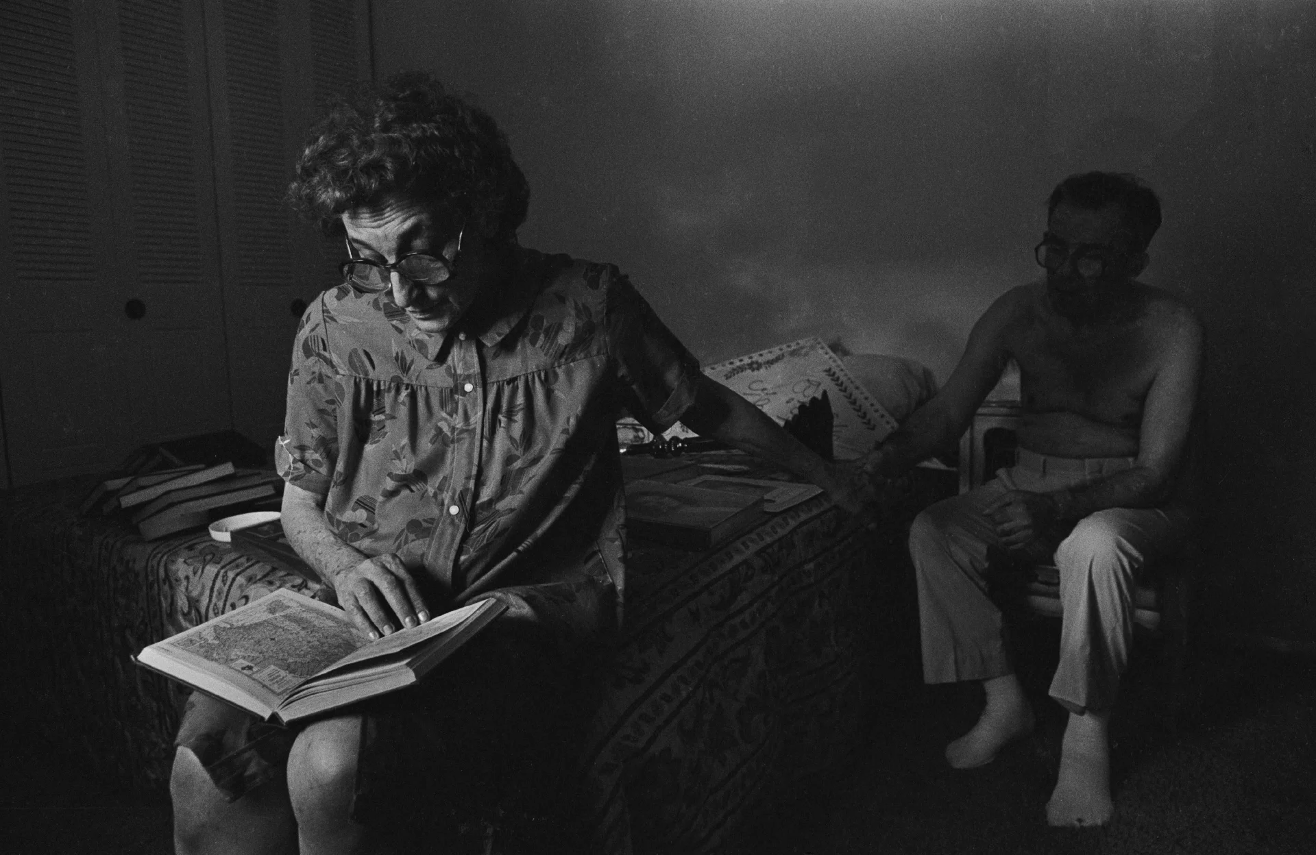 Bert Greenberg reads to her husband, Max.
