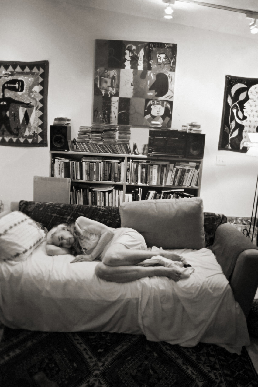  Madje lies on the couch after a nap in the early evening during a visit to her daughter's home in Miami. 