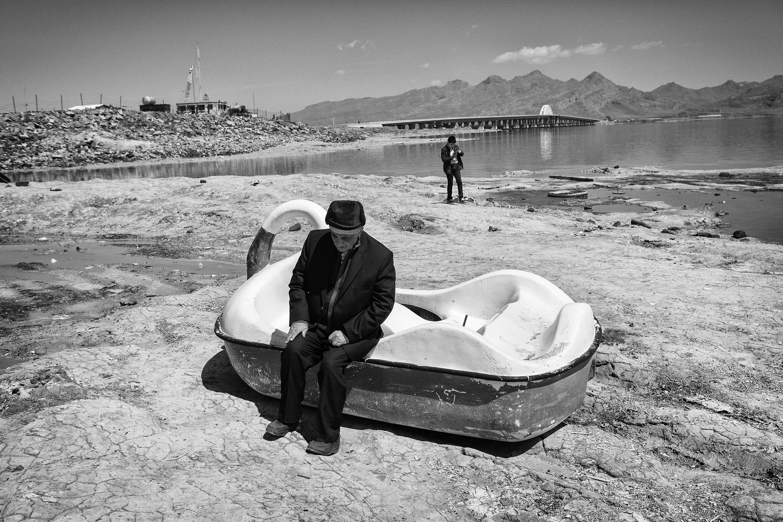  Azerbaijan, Islami Island. My father is 83 years old. He has come to the dried-up Lake Urmia for the New Year holidays. He used to swim in this lake every summer, and believed the water of the Lake was useful for his skin. Since he has been afflicte