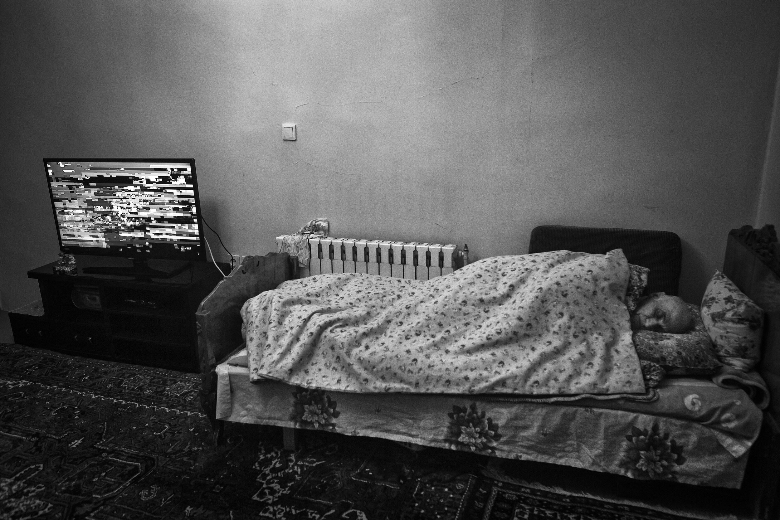  My dad is sleeping more these days. He only watches television while at home. The Baku channel, which broadcasts Azerbaijani music, is his favorite channel. Some nights the signals and pictures are not good. This night there was no signal from his f