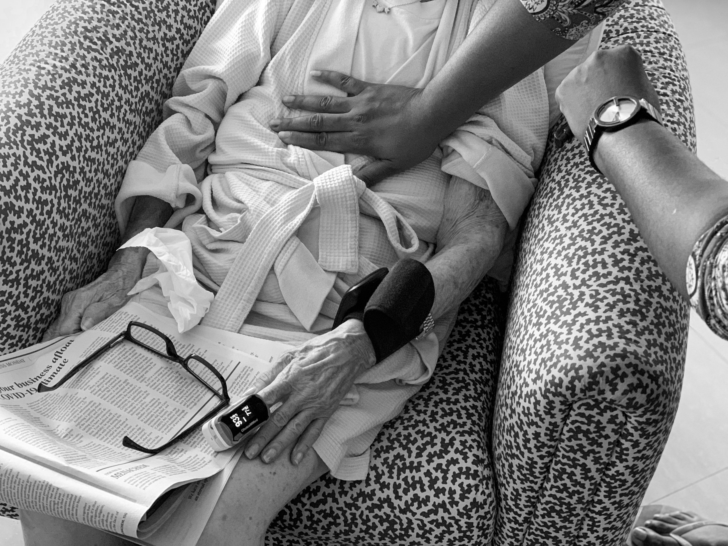  As her cancer diagnoses was being made, Sherika, Audrey's home health care aide, checks her heart rate and blood pressure. April 13, 2020 