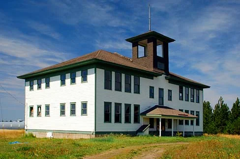 Figure 2. In 1915, an eight-room school was built in Flora, Oregon. Restored, it is known as the Flora School Education Center, featuring the pioneer arts. Source: Wikipedia