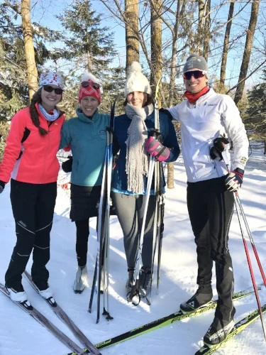 Trailside family pose at Maplelag Resort