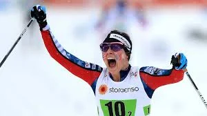 Jessie shouts after reaching the finish line in victory