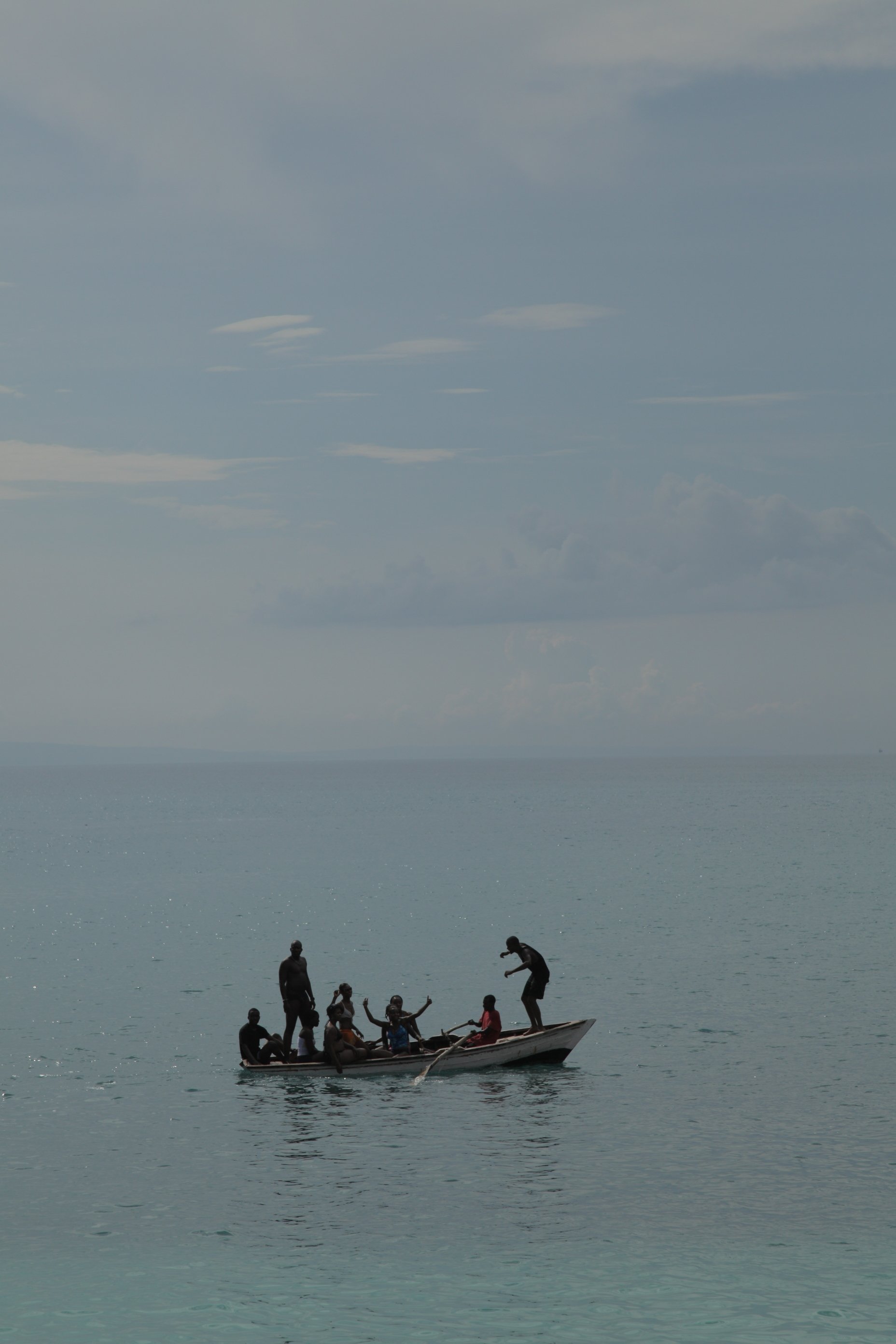 Men on boat in Haiti during filming of documentary film .jpeg