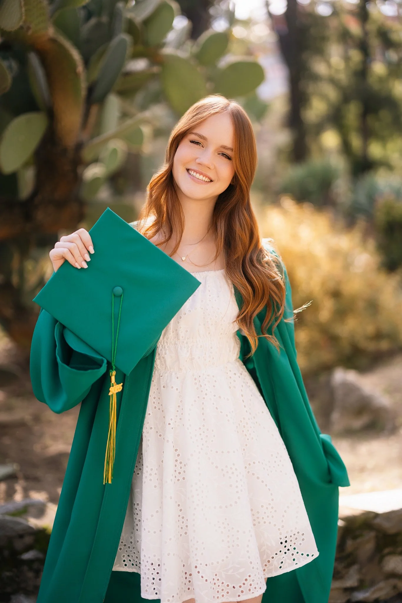 Graduation pictures in the Capital garden in Sacramento California of a girl who attended Rio Americano high