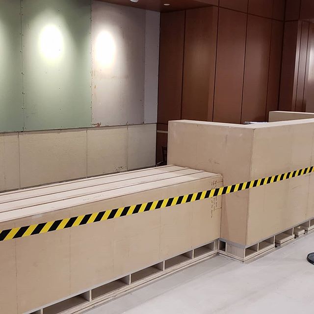 Setting the new security desk in the lobby. 
#securitydesk #diewall #customcabinets