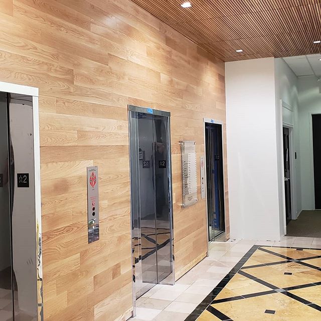 Finished up the Jefferson Plazza. We put up T&amp;G on the walls and oak strips on the ceilings on three floors. #tongueandgroove #woodceiling #lobby #elevatorlobby #woodpaneling #mirrorselfie #tongueandgroovewalls #tongueandgrooveceiling