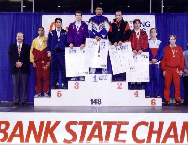 Dennis Maxon keeps his promises. After being eliminated from the state tournament on the first day without placing his junior year, he made a promise to coach Higa that he would come back the next year focused and serious enough to win state. That determination paid off a year later when Dennis found himself standing atop the state podium triumphant and champion of the 148 lb. weight class. His toughness and heart also inspired the team to push harder; that year the Bears also won a team title with Dennis as Captain.