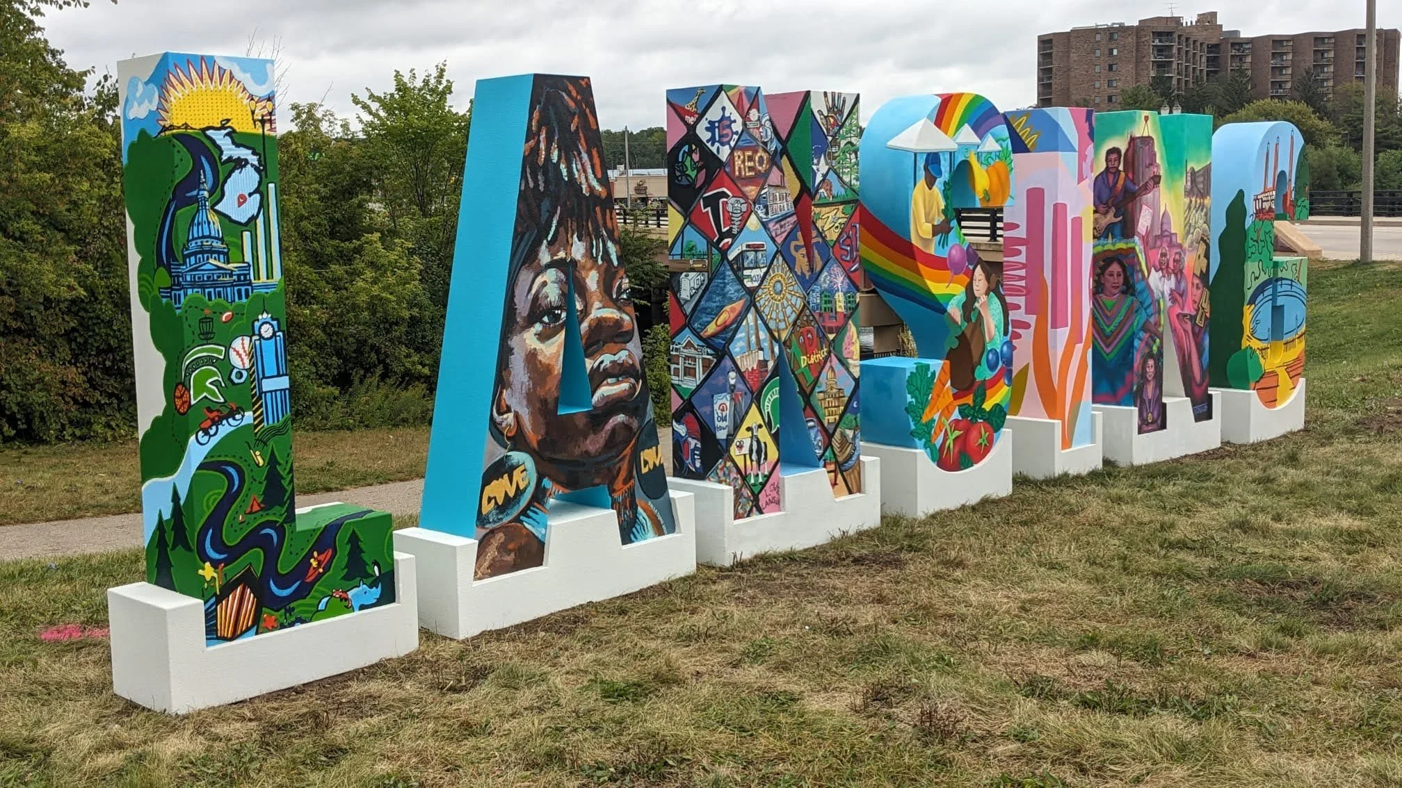 Letter "A" is for Azya. Lansing Placemaking Project

 

 2024  Northeast corner of North Grand Ave and Saginaw Street, Lansing, Michigan, USA. 