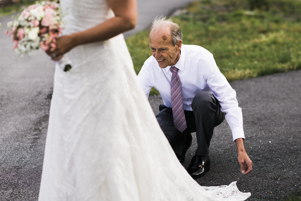 father of the bride helping