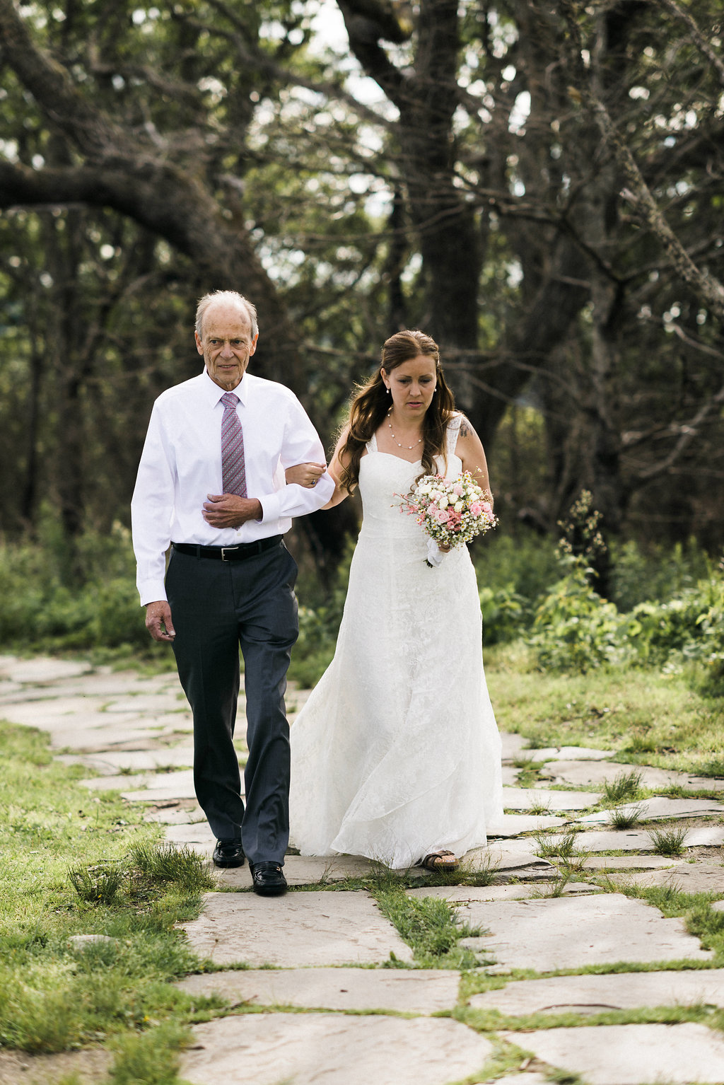 father of the bride walks bride