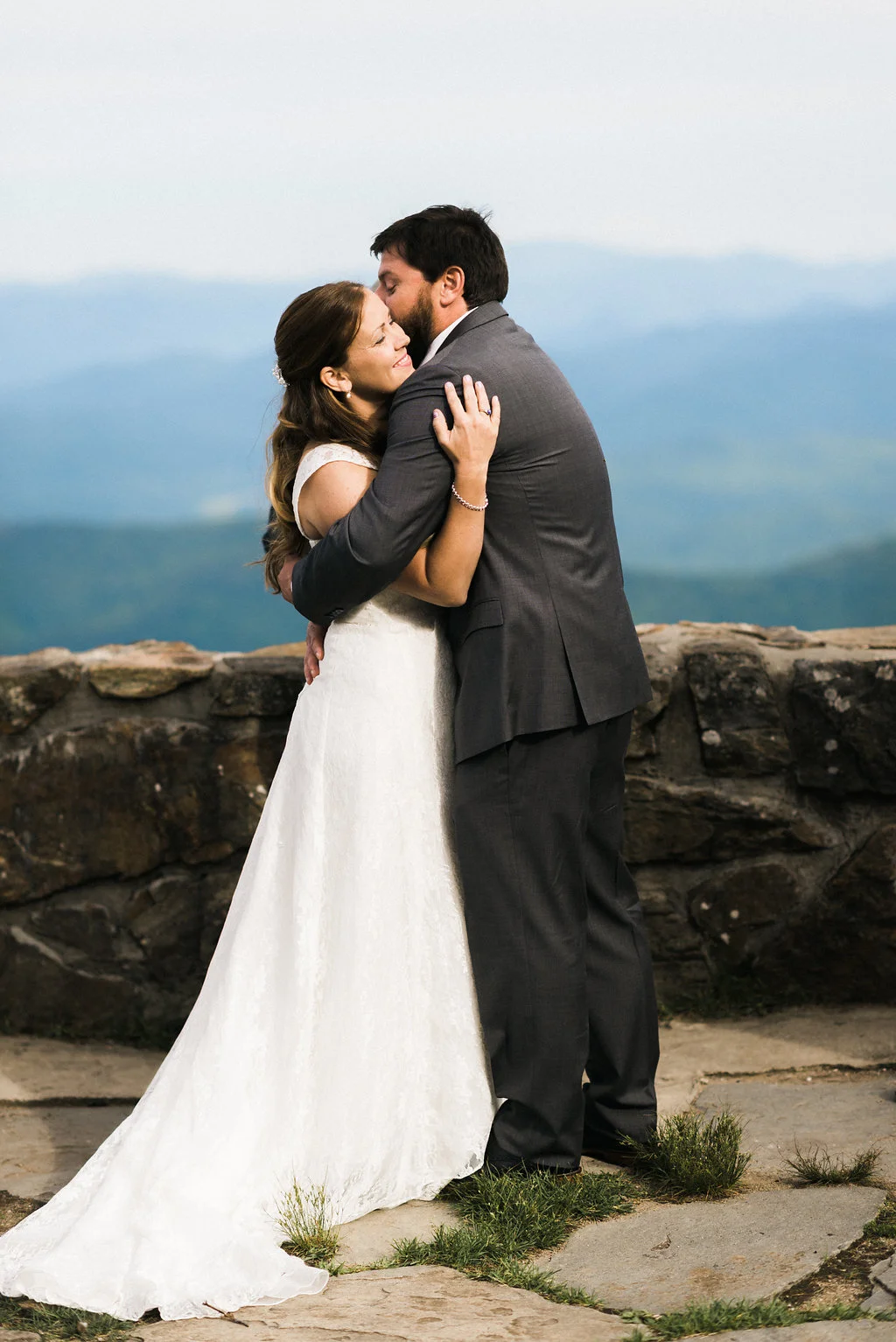 bride holds onto groom