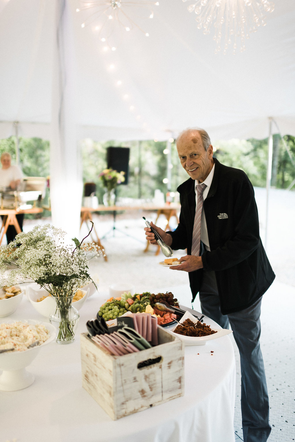 father of the bride prepping reception