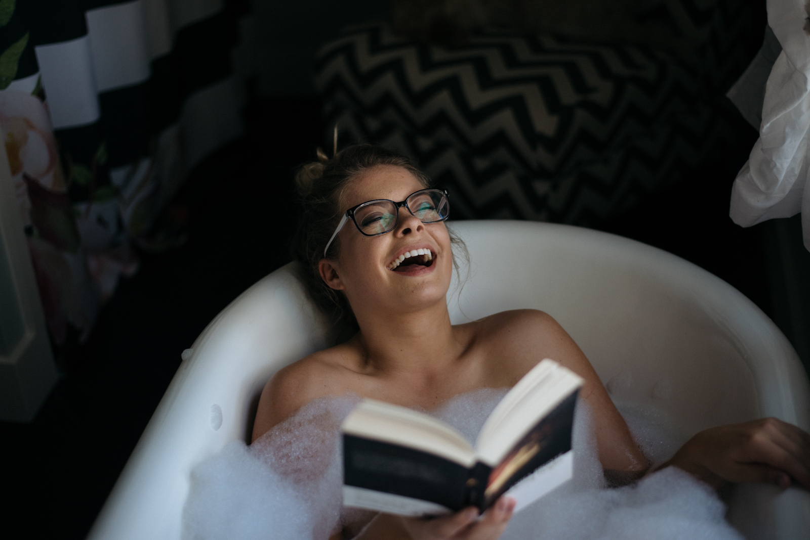 senior portrait in bubble bath